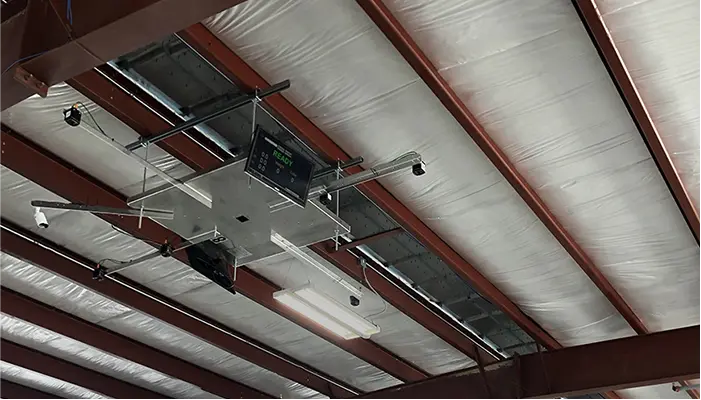 FreightSnap's FS 5000 pallet dimensioner installed inside a shipping warehouse.